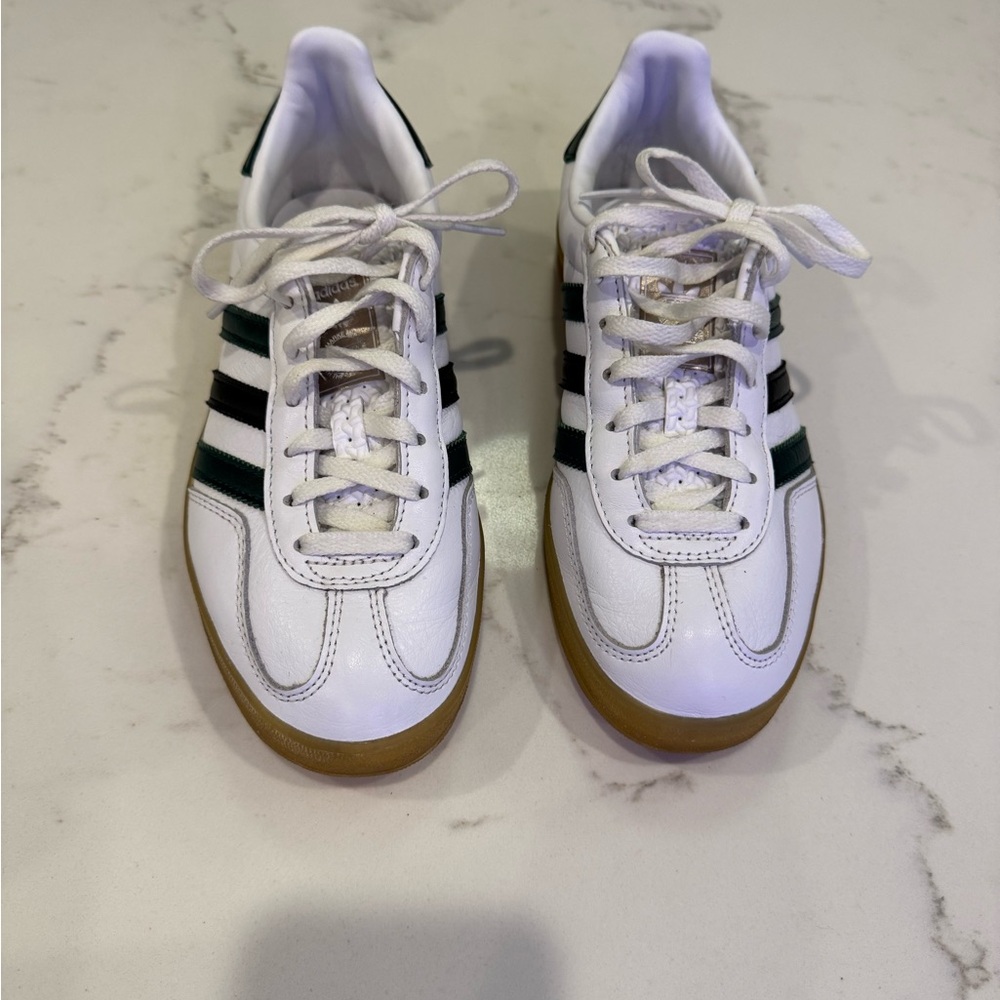 Adidas Gazelle sneakers with green and black stripes